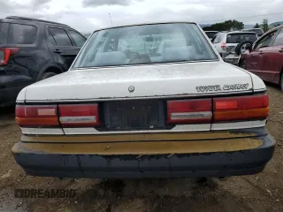 1991 Toyota Camry z VIN 4T1SV24E5MU355011, wystawiony jako Copart lot #51021185 z przebiegiem 135 881 mil mil oraz Czysty tytuł • Clean title. Historia ofert i sprzedaży dostępna na DreamBid. Obrazek 6.