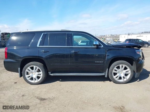 2019 Chevrolet Tahoe Premier with VIN 1GNSKCKC0KR351265, listed as a IAAI auction lot 41672192 with NaN miles. Bid and sale history available at carsss.com. Image 12.