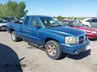 2006 Dodge Dakota SLT with VIN 1D7HW42K46S516226, listed as a IAAI auction lot 42570646 with 156,440 mi miles and . Bid and sale history available at DreamBid. Image 1.