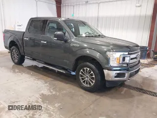 2018 Ford F-150 XL with VIN 1FTEW1EG3JKE52823, listed as a IAAI auction lot 41413009 with 142,057 mi miles. Bid and sale history available at carsss.com. Image 1.