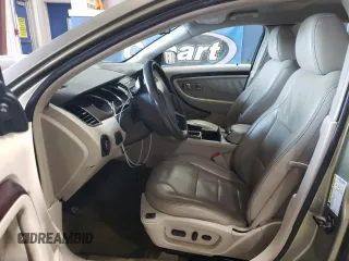 2012 Ford Taurus Limited with VIN 1FAHP2JW3CG142762, listed as a Copart auction lot 77864584 with 131,911 mi miles and Salvage title. Bid and sale history available at DreamBid. Image 7.