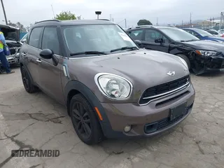 2015 MINI Countryman S z VIN WMWZC3C53FWT02232, wystawiony jako IAAI lot #42204694 z przebiegiem 107 544 mil mil oraz . Historia ofert i sprzedaży dostępna na DreamBid. Obrazek 1.