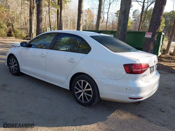 2016 Volkswagen Jetta Sedan 1.4T SE w/Connectivity with VIN 3VWD67AJ8GM409674, listed as a IAAI auction lot 41835611 with 154,602 mi miles. Bid and sale history available at carsss.com. Image 3.