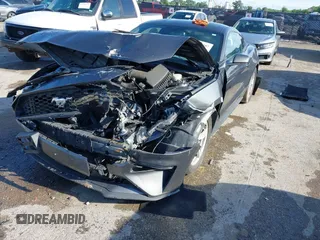 2020 Ford Mustang EcoBoost with VIN 1FA6P8TH3L5169920, listed as a IAAI auction lot 42339107 with 84,748 mi miles and . Bid and sale history available at DreamBid. Image 17.