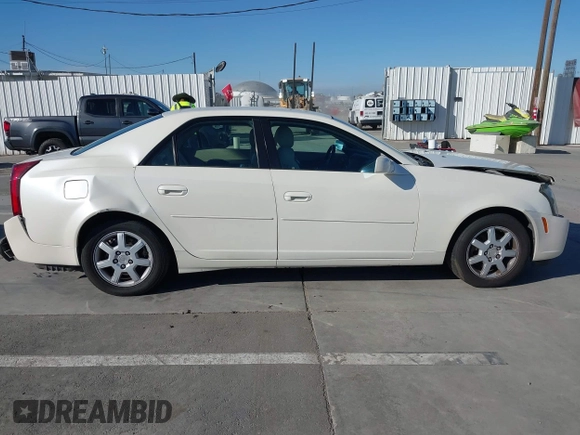 2005 Cadillac CTS z VIN 1G6DP567350152234, wystawiony jako IAAI lot #41657691 z przebiegiem 64 876 mil mil oraz . Historia ofert i sprzedaży dostępna na DreamBid. Obrazek 13.