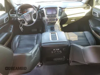 2019 GMC Yukon Denali with VIN 1GKS2CKJ9KR186604, listed as a Copart auction lot 82201124 with 110,069 mi miles and Salvage Title. Bid and sale history available at DreamBid. Image 8.
