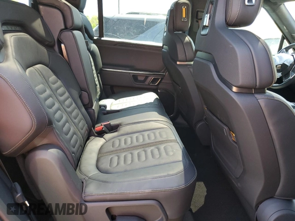 2022 Rivian R1S Launch Edition z VIN 7PDSGABLXNN002875, wystawiony jako Copart lot #55218465 z przebiegiem 25 988 mil mil oraz Szkoda całkowita • Salvage title. Historia ofert i sprzedaży dostępna na DreamBid. Obrazek 11.
