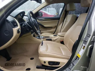 2014 BMW X1 xDrive28i with VIN WBAVL1C52EVY15236, listed as a Copart auction lot 50140885 with 141,088 mi miles and Salvage Title. Bid and sale history available at carsss.com. Image 7.