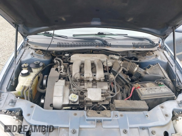 1999 Mercury Sable LS z VIN 1MEFM53S5XA647862, wystawiony jako IAAI lot #41762714 z przebiegiem 165 490 mil mil oraz . Historia ofert i sprzedaży dostępna na DreamBid. Obrazek 10.