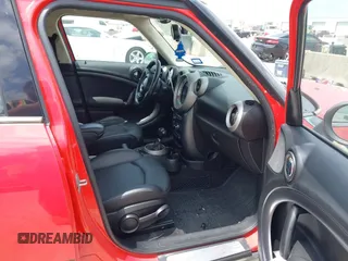 2011 MINI Countryman S z VIN WMWZC5C52BWL53856, wystawiony jako IAAI lot #42368316 z przebiegiem 107 318 mil mil oraz . Historia ofert i sprzedaży dostępna na DreamBid. Obrazek 5.