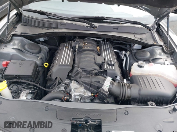2023 Dodge Charger Scat Pack Widebody with VIN 2C3CDXGJ6PH646050, listed as a IAAI auction lot 41175513 with 7,684 mi miles and . Bid and sale history available at DreamBid. Image 10.