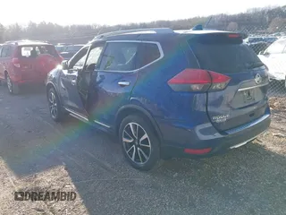 2017 Nissan Rogue SV with VIN 5N1AT2MV5HC858874, listed as a IAAI auction lot 41860634 with Not Provided miles. Bid and sale history available at carsss.com. Image 3.