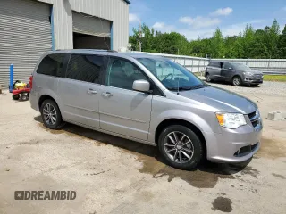 2016 Dodge Grand Caravan SXT with VIN 2C4RDGCG1GR369947, listed as a Copart auction lot 54504805 with 135,179 mi miles and Salvage Title. Bid and sale history available at DreamBid. Image 4.