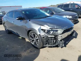 2016 Nissan Maxima SL with VIN 1N4AA6AP0GC428682, listed as a IAAI auction lot 41430434 with 105,866 mi miles and . Bid and sale history available at DreamBid. Image 1.