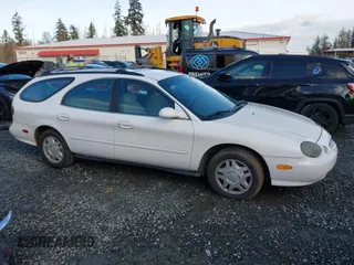 1999 Ford Taurus SE Standard with VIN 1FAFP58U5XG200924, listed as a IAAI auction lot 41501093 with 105,102 mi miles and . Bid and sale history available at DreamBid. Image 13.