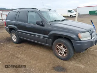 2004 Jeep Grand Cherokee Laredo z VIN 1J4GW48S34C186318, wystawiony jako IAAI lot #42770774 z przebiegiem 230 827 mil mil oraz . Historia ofert i sprzedaży dostępna na DreamBid. Obrazek 1.