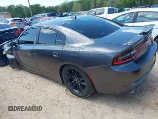 2018 Dodge Charger SXT Plus with VIN 2C3CDXHG6JH253191, listed as a IAAI auction lot 41988535 with 69,320 mi miles and . Bid and sale history available at carsss.com. Image 3.