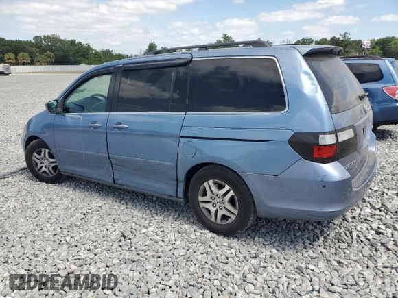 2007 Honda Odyssey EX with VIN 5FNRL38457B052131, listed as a Copart auction lot 55226575 with 165,745 mi miles and Salvage Title. Bid and sale history available at DreamBid. Image 2.