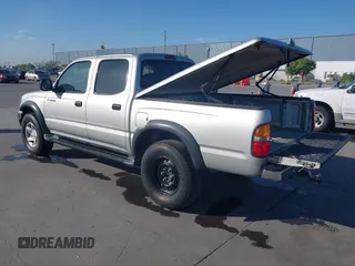2003 Toyota Tacoma PreRunner z VIN 5TEGN92N63Z152916, wystawiony jako IAAI lot #42153765 z przebiegiem 229 221 mil mil oraz . Historia ofert i sprzedaży dostępna na DreamBid. Obrazek 3.