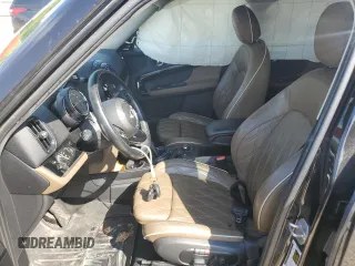 2017 MINI Countryman Cooper S with VIN WMZYT3C39H3D98677, listed as a Copart auction lot 71831944 with 56,638 mi miles and Salvage Title. Bid and sale history available at carsss.com. Image 7.