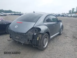 2012 Volkswagen Beetle 2.5L PZEV with VIN 3VWJP7AT2CM618436, listed as a IAAI auction lot 42297812 with 139,869 mi miles and . Bid and sale history available at DreamBid. Image 4.