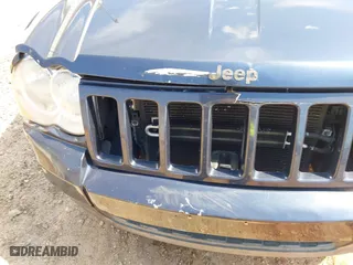 2010 Jeep Grand Cherokee Laredo with VIN 1J4PS4GK0AC112654, listed as a IAAI auction lot 41809445 with 418,301 mi miles. Bid and sale history available at carsss.com. Image 13.