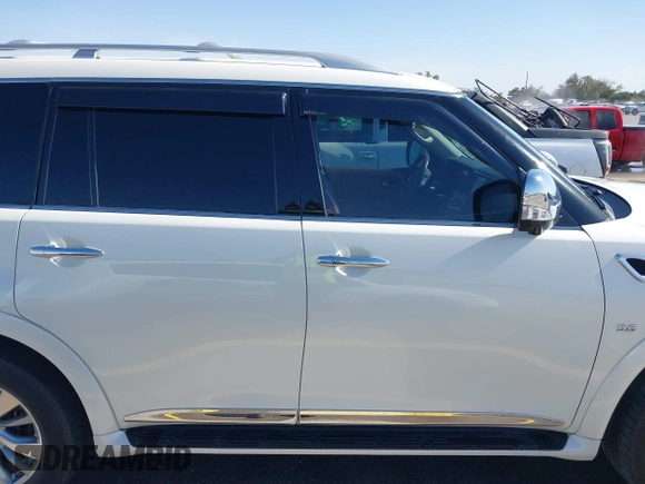 2016 Infiniti QX80 z VIN JN8AZ2NC2G9400211, wystawiony jako IAAI lot #41818944 z przebiegiem 108 206 mil mil oraz . Historia ofert i sprzedaży dostępna na DreamBid. Obrazek 13.
