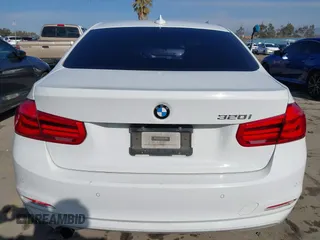 2016 BMW 3 Series 320i with VIN WBA8A9C59GK615704, listed as a IAAI auction lot 41431347 with 76,827 mi miles. Bid and sale history available at carsss.com. Image 16.
