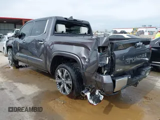 2022 Toyota Tundra Capstone Hybrid with VIN 5TFVC5DB6NX005465, listed as a IAAI auction lot 41589222 with 28,452 mi miles and . Bid and sale history available at DreamBid. Image 3.