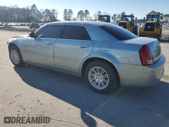 2005 Chrysler 300 with VIN 2C3JA43R95H168570, listed as a Copart auction lot 87672695 with 82,171 mi miles and Salvage Title. Bid and sale history available at carsss.com. Image 2.