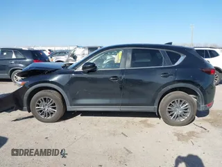 2020 Mazda CX-5 Touring with VIN JM3KFACM0L0780265, listed as a IAAI auction lot 41825873 with 151,888 mi miles. Bid and sale history available at carsss.com. Image 14.