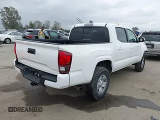 2021 Toyota Tacoma SR with VIN 3TYAX5GNXMT032184, listed as a IAAI auction lot 42204429 with 60,295 mi miles and . Bid and sale history available at DreamBid. Image 4.