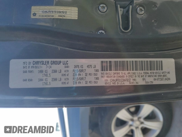 2014 Jeep Patriot Latitude with VIN 1C4NJRFB1ED847612, listed as a Copart auction lot 62721605 with 126,268 mi miles and Salvage title. Bid and sale history available at DreamBid. Image 12.