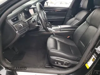 2013 BMW 7 Series 740Li with VIN WBAYE4C51DD137687, listed as a Copart auction lot 76103944 with 134,609 mi miles and Salvage title. Bid and sale history available at DreamBid. Image 7.