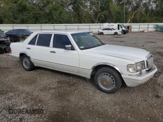1990 Mercedes-Benz 560 with VIN WDBCA39E8LA536590, listed as a Copart auction lot 76843244 with 231,703 mi miles and Non Repairable. Bid and sale history available at DreamBid. Image 4.