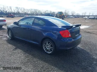 2006 Scion tC with VIN JTKDE177060128395, listed as a IAAI auction lot 41934031 with 181,740 mi miles. Bid and sale history available at carsss.com. Image 3.