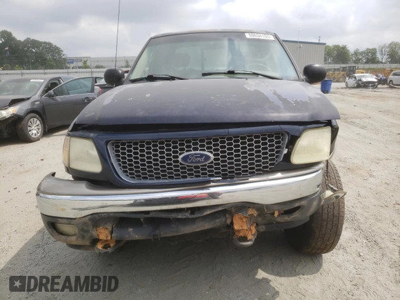 2002 Ford F-150 XL z VIN 1FTRX18L12NB86774, wystawiony jako Copart lot #59634165 z przebiegiem 262 567 mil mil oraz Szkoda całkowita • Salvage title. Historia ofert i sprzedaży dostępna na DreamBid. Obrazek 5.