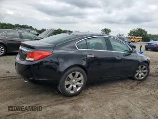 2013 Buick Regal Turbo Premium 1 z VIN 2G4GS5EV0D9208011, wystawiony jako Copart lot #64275305 z przebiegiem 49 106 mil mil oraz Szkoda całkowita • Salvage title. Historia ofert i sprzedaży dostępna na DreamBid. Obrazek 3.