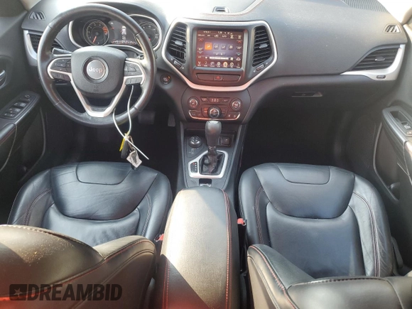2016 Jeep Cherokee Trailhawk z VIN 1C4PJMBS6GW252974, wystawiony jako Copart lot #63652465 z przebiegiem 160 641 mil mil oraz Szkoda całkowita • Salvage title. Historia ofert i sprzedaży dostępna na DreamBid. Obrazek 8.