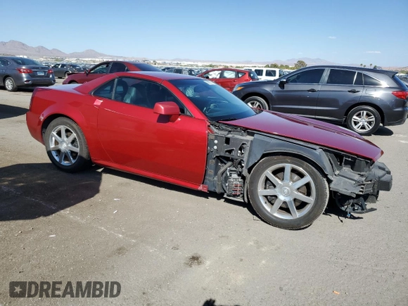 2004 Cadillac XLR z VIN 1G6YV34A345600127, wystawiony jako Copart lot #68859774 z przebiegiem 40 727 mil mil oraz Szkody całkowita. Historia ofert i sprzedaży dostępna na DreamBid. Obrazek 4.