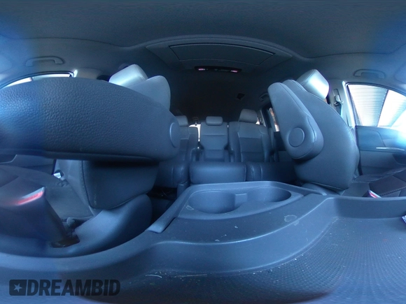 2014 Honda Odyssey Touring with VIN 5FNRL5H94EB110590, listed as a IAAI auction lot 42092929 with 242,338 mi miles and . Bid and sale history available at DreamBid. Image 21.