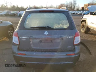 2010 Suzuki SX4 with VIN JS2YB5A31A6300055, listed as a Copart auction lot 82596904 with 80,715 mi miles and Salvage Title. Bid and sale history available at carsss.com. Image 6.