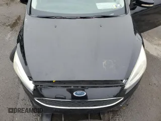 2016 Ford Focus SE z VIN 1FADP3F26GL340954, wystawiony jako Copart lot #60989915 z przebiegiem 26 052 mil mil oraz Szkoda całkowita • Salvage title. Historia ofert i sprzedaży dostępna na DreamBid. Obrazek 11.