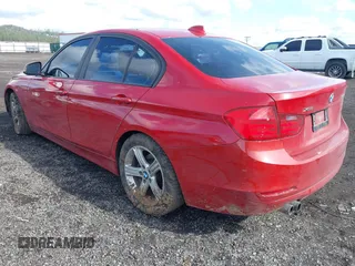 2013 BMW 3 Series 328i xDrive with VIN WBA3B5C51DF590673, listed as a IAAI auction lot 41720742 with 91,147 mi miles. Bid and sale history available at carsss.com. Image 3.