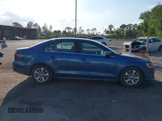2016 Volkswagen Jetta Sedan 1.4T SE with VIN 3VWD67AJ0GM328412, listed as a IAAI auction lot 41556254 with 137,814 mi miles. Bid and sale history available at carsss.com. Image 13.