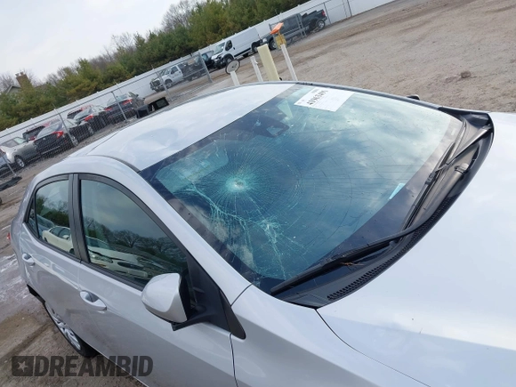 2019 Toyota Corolla L with VIN 5YFBURHE2KP934042, listed as a IAAI auction lot 41963491 with 87,299 mi miles. Bid and sale history available at carsss.com. Image 6.