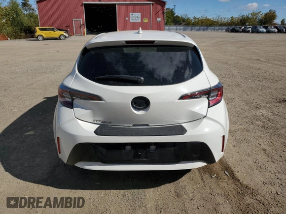 2019 Toyota Corolla Hatchback SE with VIN JTNK4RBEXK3011658, listed as a Copart auction lot 74301574 with 98,486 mi miles and Clean Title. Bid and sale history available at carsss.com. Image 6.