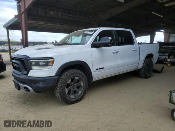 2019 Ram 1500 Rebel z VIN 1C6SRFLTXKN618849, wystawiony jako Copart lot #50419595 z przebiegiem 98 219 mil mil oraz Szkoda całkowita • Salvage title. Historia ofert i sprzedaży dostępna na DreamBid. Obrazek 1.