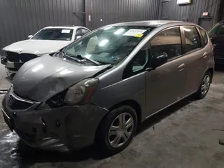 2010 Honda Fit with VIN JHMGE8H29AS020675, listed as a IAAI auction lot 41832465 with 212,713 mi miles. Bid and sale history available at carsss.com. Image 2.