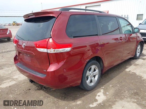 2014 Toyota Sienna LE AAS with VIN 5TDKK3DC4ES462090, listed as a IAAI auction lot 41942354 with 215,814 mi miles. Bid and sale history available at carsss.com. Image 4.